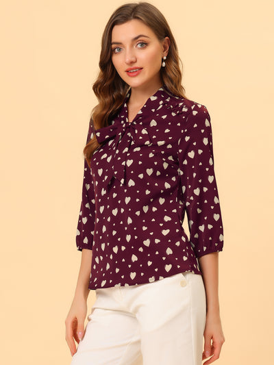 Printed Ruffle Shoulder Elastic Cuff Bow Tie Neck Blouse